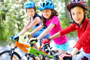 Children outdoor cycling